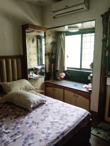 Bedroom in 2 BHK Apartment at Raheja Reflections, Kandivali East – for Rent