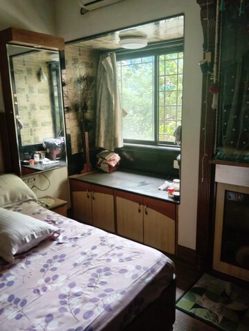 Bedroom in 2 BHK Apartment at Raheja Reflections, Kandivali East – for Rent
