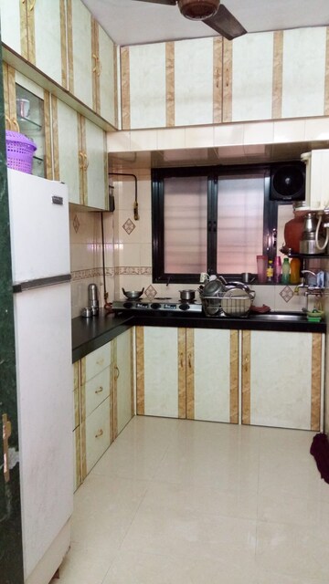 Kitchen in 3 BHK Apartment at Aangan CHS, Kandivali East – for Rent