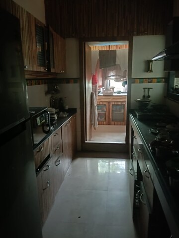 Kitchen in 3 BHK Apartment at Aangan CHS, Kandivali East – for Rent