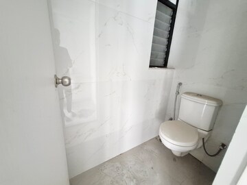 Bathroom in 1 BHK Apartment at Runwal Gardens, Dombivli East – for Rent