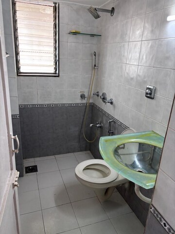 Bathroom in 2 BHK Apartment at Pooja CHS Andheri West, Andheri West – for Rent