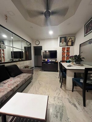 Living Room in 2 BHK Apartment at Gundecha Greens, Kandivali East – for Sale