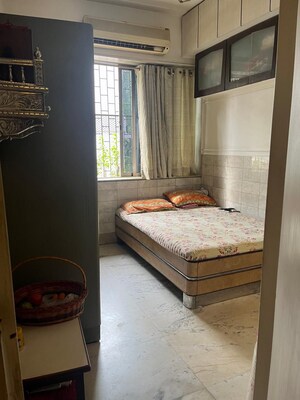 Bedroom in 2 BHK Apartment at Gundecha Greens, Kandivali East – for Sale