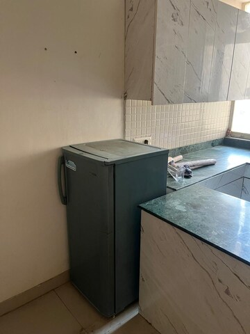 Kitchen in 2 BHK Apartment at Breez Global Heights, Sohna Sector 33 – for Rent