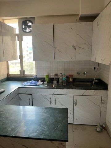 Kitchen in 2 BHK Apartment at Breez Global Heights, Sohna Sector 33 – for Rent