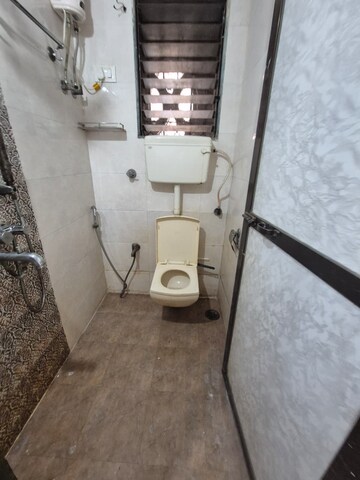 Bathroom in 1 BHK Apartment at Kopar Khairane – for Rent