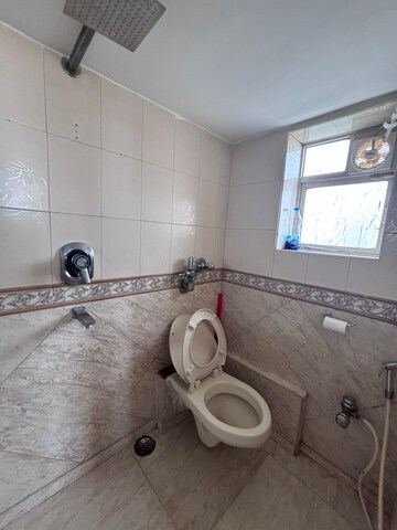 Bathroom in 2 BHK Apartment at Seven Bungalow, Andheri West – for Rent