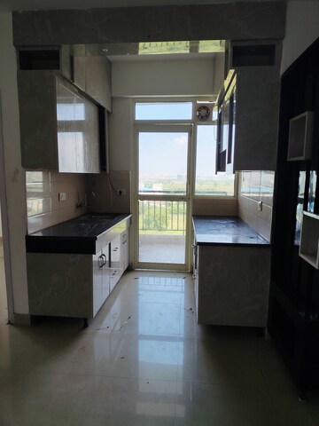 Kitchen in 2 BHK Apartment at Suncity Avenue 76, Sector 76 – for Rent