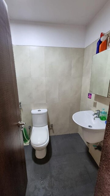 Bathroom in 2 BHK Apartment at Unnati Woods CHS, Kasarvadavali – for Rent
