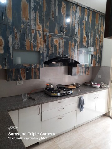 Kitchen in 3.5 BHK Builder Floor at Puri Aman Vilas, Sector 89 – for Rent