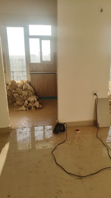 Living Room in 4 BHK Apartment at Amrapali Crystal Homes, Sector 76 – for Rent