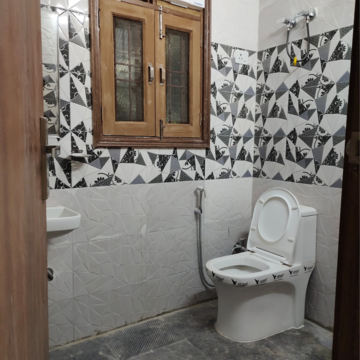 Bathroom in 2 BHK Builder Floor at Palm Residency Chhatarpur, Rajpur Khurd Extension – for Rent