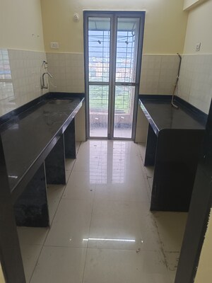 Kitchen in 3 BHK Apartment at Hubtown Greenwoods, Vartak Nagar – for Sale