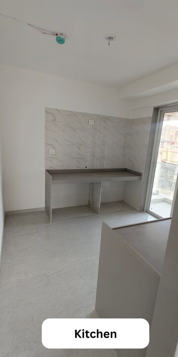 Kitchen in 3 BHK Apartment at Shreenathji Celestial Heights, Malad West – for Sale