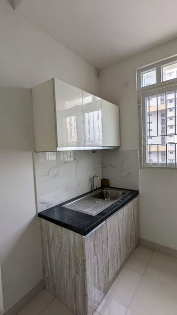 Kitchen in 2 BHK Apartment at Brigade Cornerstone Utopia, Varthur – for Rent