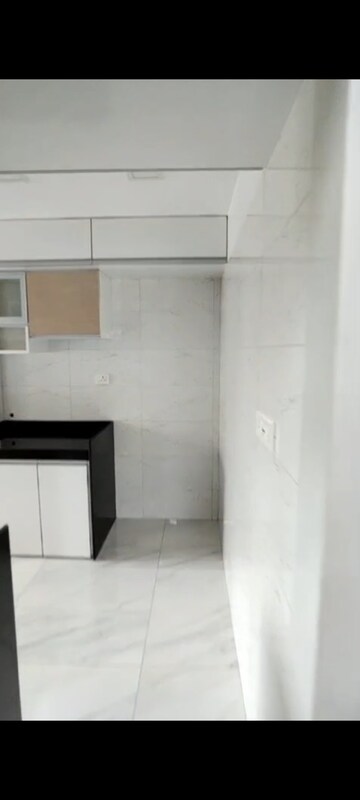 Kitchen in 3 BHK Apartment at Paranjape Schemes Royal Court, Andheri East – for Rent
