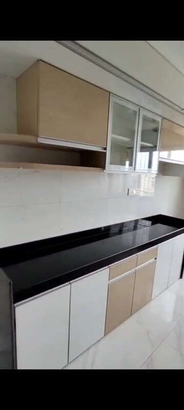 Kitchen in 3 BHK Apartment at Paranjape Schemes Royal Court, Andheri East – for Rent
