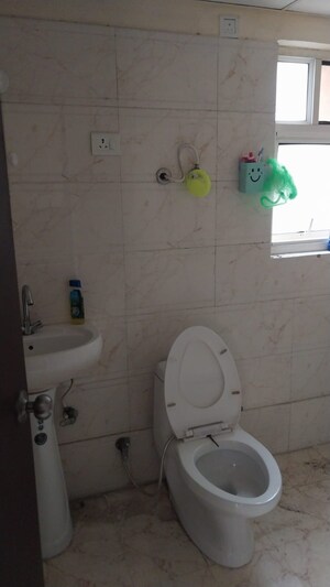 Bathroom in 1 BHK Apartment at Eureka Diya Green City, Raj Nagar Extension – for Sale