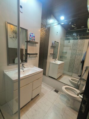 Bathroom in 4 BHK Builder Floor at South Extension ii – for Sale