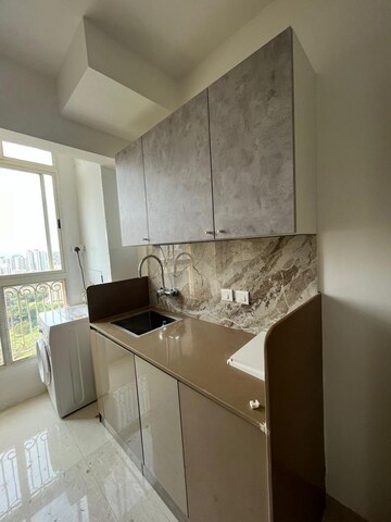 Kitchen in 3 BHK Apartment at Cosmos Jewels, Ghodbunder Road – for Rent