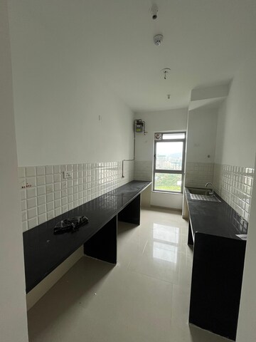 Kitchen in 2 BHK Apartment at Kalpataru Immensa, Kolshet Road – for Rent