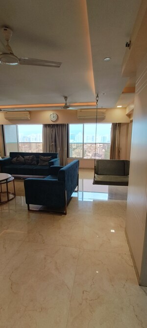 Living Room in 4 BHK Apartment at Paradigm Ananda Residency, Borivali West – for Sale