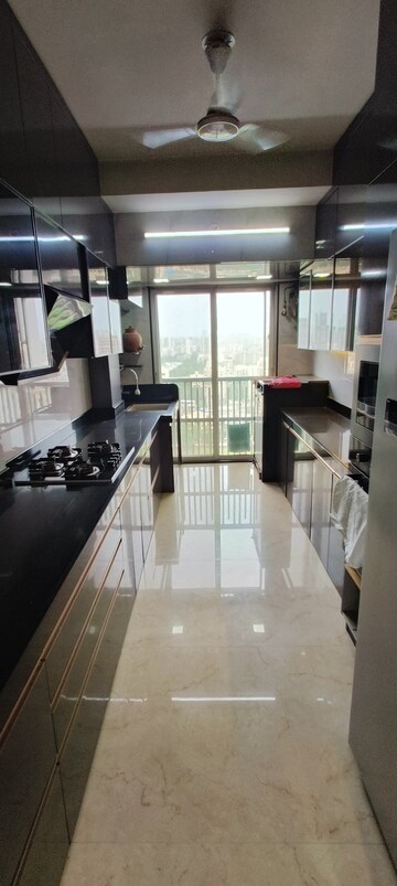 Kitchen in 4 BHK Apartment at Paradigm Ananda Residency, Borivali West – for Sale