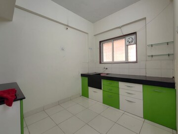 Kitchen in 1 BHK Apartment at Kumar Samruddhi Society, Vishrantwadi – for Sale