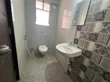Bathroom in 2 BHK Apartment at Sukhwani Coloronic, Ravet – for Rent