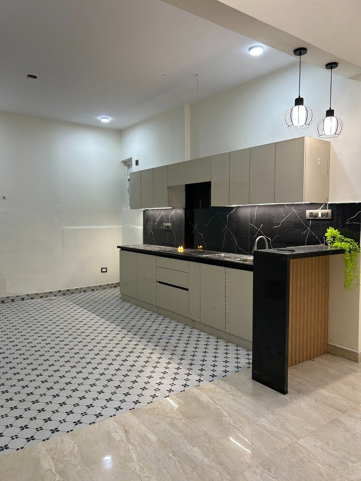 Kitchen, unishire-esplanade 4 Bedroom 4704 Sq.Ft. Villa In Thanisandra Main Road Bangalore 9166376