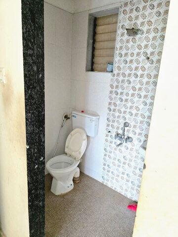 Bathroom in 2 BHK Apartment at Raj Tulsi Aanand, Badlapur East – for Rent