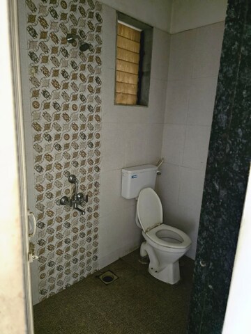 Bathroom in 2 BHK Apartment at Raj Tulsi Aanand, Badlapur East – for Rent