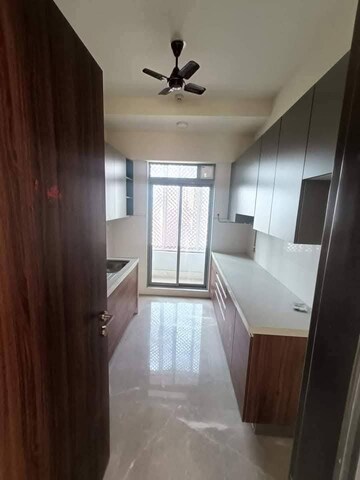 Kitchen in 2 BHK Apartment at Piramal Vaikunth, Balkum Pada – for Rent
