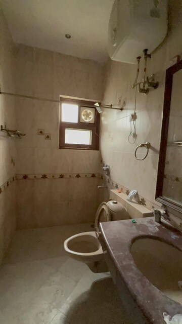 Bathroom in 3 BHK Builder Floor at Sukhdev Vihar – for Rent
