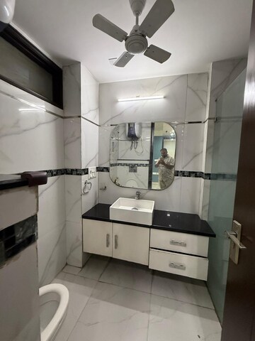 Bathroom in 4 BHK Builder Floor at Kalkaji – for Rent