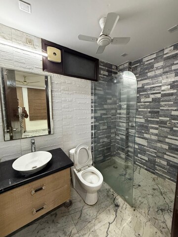 Bathroom in 4 BHK Builder Floor at Kalkaji – for Rent