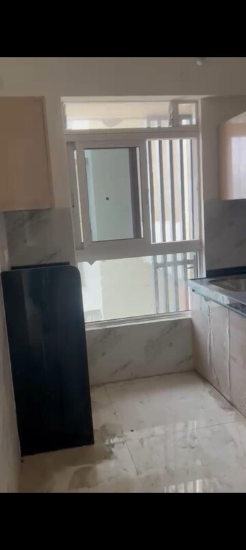 Kitchen in 2 BHK Apartment at Wadhwa TW Gardens, Kandivali East – for Rent