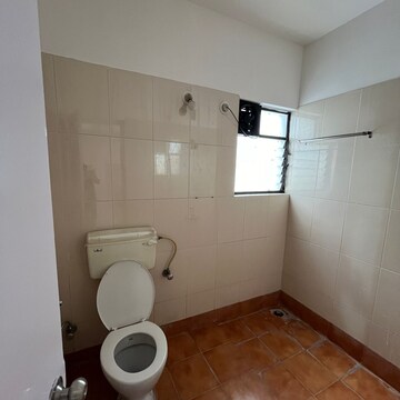 Bathroom in 3 BHK Apartment at Nyati Empire, Santipur – for Rent