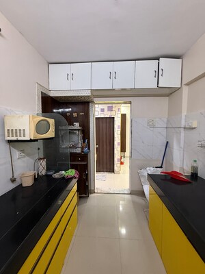 Kitchen in 2 BHK Apartment at Sagar Residency Thane, Kasarvadavali – for Sale