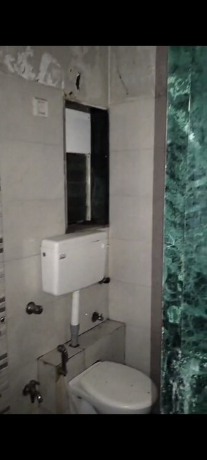 Bathroom in 1 BHK Apartment at Alfa Mana Residence, Mazgaon – for Sale
