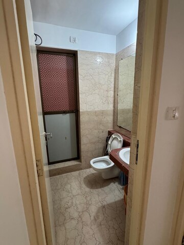 Bathroom in 2 BHK Apartment at Kalpataru Aura, Ghatkopar West – for Rent