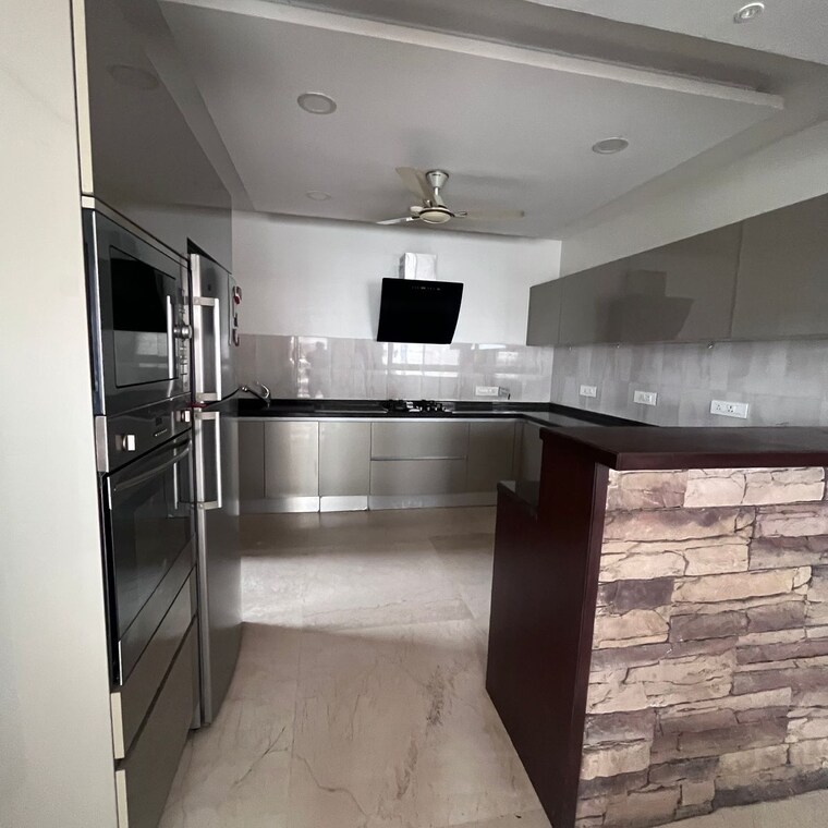 Kitchen, gera-trinity-towers 3.5 Bedroom 1500 Sq.Ft. Apartment In Kharadi Pune 9167368