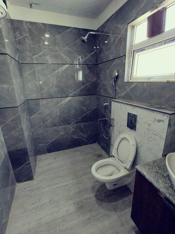 Bathroom in 4 BHK Builder Floor at Palam Vihar Residents Association, Palam Vihar – for Rent