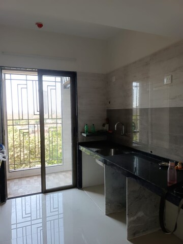 Kitchen in 1 BHK Apartment at Regency Anantam, Dombivli East – for Rent