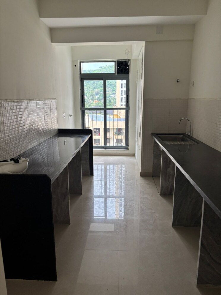 Kitchen, kalpataru-elitus 2 Bedroom 802 Sq.Ft. Apartment In Mulund West Mumbai 9167564