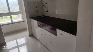 Kitchen in 1 BHK Apartment at Raunak Delight, Owale – for Rent