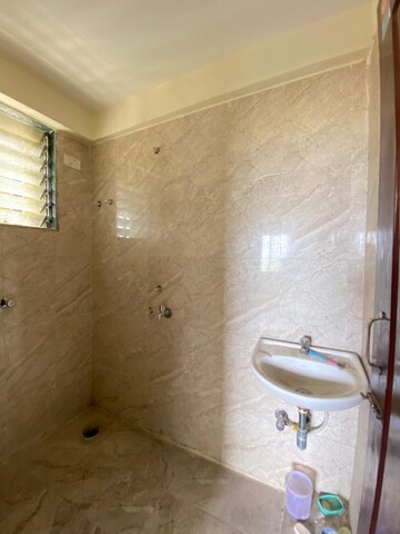 Bathroom in 1 BHK Apartment at Lodha Golden Dream, Dombivli East – for Rent