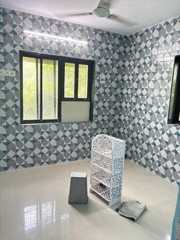 Living Room in 1 BHK Apartment at Deepanjali CHS, Malad West – for Rent