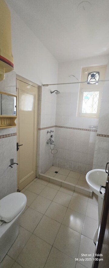 Bathroom in 4 BHK Builder Floor at Sarvodaya Enclave – for Rent